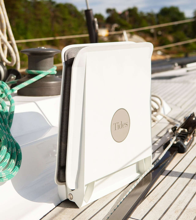 Portable winch seat for sailboat by Tides, designed for comfort and convenience on the water.